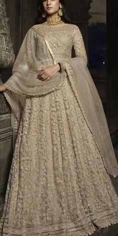 Beige and Brown color Salwar Kameez in Net fabric with Embroidered, Stone, Thread, Zari work. Shop @ https://www.indianweddingsaree.com/product/net-bridal-salwar-kameez-in-beige-and-brown-with-embroidered-work-1927442 Bridal Anarkali Suits, Bridal Anarkali, Sonal Chauhan, Ethnic Clothes, Net Gowns, Anarkali Dresses, Designer Anarkali Suits, Floral Lehenga, Abaya Style