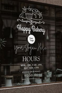 a sign in the window of a bakery that says happy bakery you're going here hours