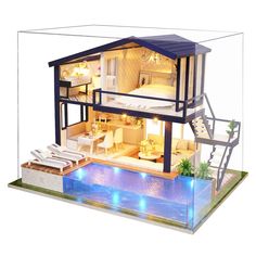 a doll house with an indoor swimming pool