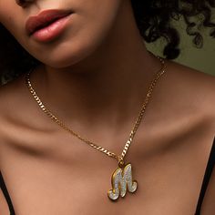 Our popular Double Plated Iced Out Initial Necklace boasts a chic and elegant design, handcrafted to perfection. The model showcases the necklace with an 18-inch Figaro chain (see video for reference). You can personalize this item with Letters, Numbers, and Roman Numerals and choose from chain lengths of 14", 16", 18", and 20". Each chain features a lobster clasp closure for secure wear.Chain width:Cuban Chain - 3.7 mmFigaro Chain - 3 mm Metal Selection: Gold Plated Silver Plated 14K Gold over Elegant Charm Necklace With Curb Chain As Gift, Elegant Curb Chain Charm Necklace For Gift, Elegant Curb Chain Charm Necklace Gift, Elegant Pendant Necklace With Curb Chain, Gift Jewelry With Initial Pendant And Curb Chain, Elegant Gold Chain Necklace With Initial Pendant, Fine Jewelry Cuban Link Necklace, Luxury Personalized Cuban Link Jewelry, Gift Necklace With Initial Pendant And Curb Chain