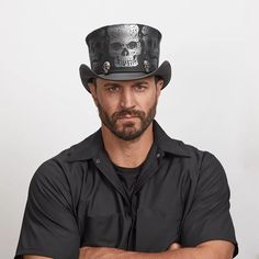 Man with a serious expression wearing a  Silver Skull Leather Hat Festival Top Hat With Short Brim, Skull Ornaments, Adam Rose, Straw Cowgirl Hat, White Cowboy Hat, Leather Top Hat, Brown Cowboy Hat, Hats For Big Heads, Skull Shape