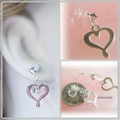 Heart Dangle Earrings 1 Pair Metal: Shiny Silver Tone  Choose Plastic Invisible Clips,  metal clips, or fish hook types for pierced ears.  Size:  Approximately 3/4 inch long (drop size) See the picture(s) for more details. Please allow 2 to 4 business days to ship your order. The additional shipping charge, when combined with another item, is 25 cents (Combined Payment Only). Add items to the cart to combine. Visit my Etsy Shop: https://www.etsy.com/shop/JuiceboxJewels I do not take returns/exchanges on earrings for hygienic reasons. Adjustable Metal Heart Drop Earrings, Metal Heart Dangle Earrings, Adjustable Dangle Heart Earrings, Silver Dangle Earrings With Heart Charm, Hypoallergenic Metal Heart Dangle Earrings, Heart Shaped Metal Clip-on Earrings For Gift, Unique Nickel-free Dangle Heart Earrings, Silver Heart-shaped Earrings With Dangling Charms, Red Nickel-free Dangle Heart Earrings