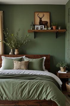 a bed with green sheets and pillows in a bedroom next to a window filled with potted plants