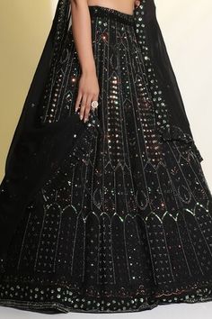 Black cancan attached lehenga featuring sequin, bead, cutdana, resham work all over. Paired with a sequin flower embellished padded blouse and dupatta. - Aza Fashions Embellished Wedding Sets, Black Embellished Sharara For Diwali, Glamorous Black Dresses For Reception, Floor-length Party Choli With Motifs, Party Floor-length Choli With Motifs, Black Embellished Sets For Reception, Navratri Party Lehenga With Motifs, Party Lehenga With Motifs For Navratri, Anarkali Choli With Motifs For Party