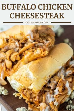 the best buffalo chicken cheesesteak sandwich is cut in half on a cutting board