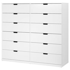 a white chest of drawers with black handles on each drawer and two rows of drawers at the bottom