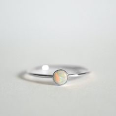 Natural Opal Ring, 925 Sterling Silver, Round Opal Gemstone Ring, Natural Gemstone, Simple Band Ring, Christmas Gift, Can Be Personalized Ring Metal :- 925 Sterling Silver (Stamp on the Product) **Gemstone Size depends on the Ring Size.** **The Product you will receive may vary from the image as no two gemstone are similar and images cannot define exact product definitions.** Shipping Policy:- I mainly use DHLE, PPS, FedEx for the shipping of goods depending on the amount and days that you have Adjustable White Gold Opal Birthstone Ring, Round Solitaire Opal Ring Gift, Minimalist White Gold Opal Ring, Silver Opal Stackable Rings As Gift, Silver Stackable Opal Ring As Gift, Sterling Silver Opal Ring Gift, Sterling Silver Opal Ring With Bezel Setting, Stackable Silver Opal Ring As Gift, Sterling Silver Opal Ring With Round Stone