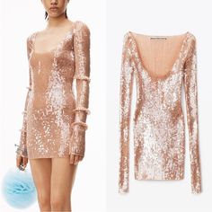 a sequin dress with long sleeves and cutouts on the shoulders is shown in this image