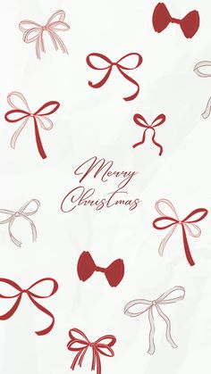 red bows on white paper with merry christmas written in the bottom right corner and below