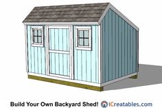 a small shed with the door open and windows on it's side, in front of