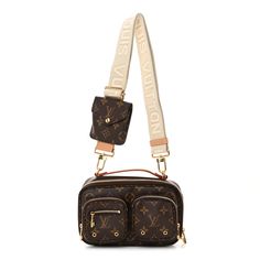 This is an authentic LOUIS VUITTON Monogram Utility Crossbody. This chic crossbody bag is crafted of traditional monogram coated canvas. The bag features two front zipper compartments, a vachetta leather top handle, an optional, adjustable fabric shoulder strap, and a removable coin purse. The wrap-around zippers open to a brown fabric interior with patch pockets. Lv Utility Crossbody Bag, Traditional Monogram, Louis Vuitton Monogram Bag, Chic Crossbody Bag, Louis Vuitton Crossbody Bag, Louis Vuitton Crossbody, Louis Vuitton Empreinte, Lv Monogram, Monogram Bag