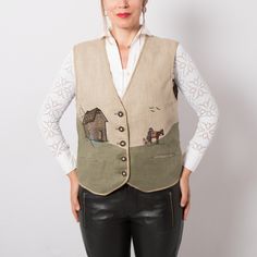 "The vest closes in the front with antler buttons. The 1990s Austrian vintage trachten waistcoat has two pockets on the front and embroidered details, house by the river and men with the horse. The vest is lined in a brown satin polyester fabric and has an extra button. Very Good Condition m e a s u r e m e n t s (taken while item is lying flat): Around Armpits: 37.8\" / 96 cm Waist: 37\" / 94 cm Length 22\" / 56 cm (measurements of armpit, waist, and hips are doubled ) Model is 170 cm or 5.5 fe Vintage Embroidered Fitted Vest, Fitted Vintage Vest With Embroidery, Vintage Fitted Embroidered Vest, Vintage Fall Vest With Buttons, Vintage Beige Winter Vest, Fitted Vintage Beige Vest, Fitted Beige Vintage Vest, Vintage Beige Vest For Fall, Vintage Embroidered Beige Outerwear