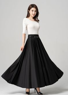 "This black pleated maxi skirt is the perfect combination of comfort and style. The elegant and flowy design is made with high-quality materials that drape beautifully on any figure. The versatile style and classic color make it easy to dress up or down, so you can wear it for any occasion. The pleated design adds a touch of femininity and movement to your look, making it perfect for choosing. DETAIL * 100% polyester * Pleated skirt * Ankle Length * Two pockets * Belt loops on waistband * Side z Formal Pleated Maxi Length Skirt, Elegant Full Length Pleated Maxi Skirt, Evening Full Length Pleated Maxi Skirt, Full Length Pleated Maxi Skirt For Evening, Pleated Maxi Skirt For Evening, Formal Black Flowy Pleated Skirt, Formal Full-length Pleated Maxi Skirt, Elegant Maxi Length Skirt, Full Pleated Skirt For Evening