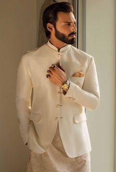 Elegant prince coat features rich quality embellishments accentuate on front and collar Complement with matching kurta pajama Designer Mens Prince Coat Suits Cambridge England UK High Quality Mens Prince Coat Prince Coat Design For Men, Fitted Sherwani With Stand Collar For Diwali, Formal Nehru Jacket With Resham Embroidery For Eid, Elegant Nehru Jacket With Stand Collar For Designer Wear, Festive Stand Collar Sherwani For Wedding, Elegant Designer Nehru Jacket With Stand Collar, Elegant Stand Collar Kurta For Wedding, Embroidered Nehru Jacket For Diwali Semi-formal Occasions, Elegant Wedding Kurta With Stand Collar