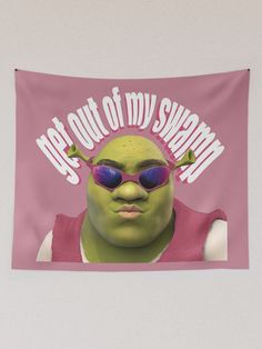 a pink and white wall hanging with an image of the shrap wearing sunglasses