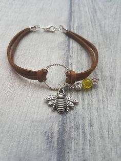 Bee charm bracelet Bee Bracelet Bee charm Charm Bracelet Bee Charm Jewelry, Bee Charm For Bracelet, Diy Charm Bracelet Ideas, Suede Bracelet Diy, Leather Bracelet Tutorial, Bee Bracelet, Silver Initial Charms, Suede Bracelet, Leather Charm Bracelets