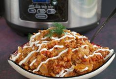 a bowl filled with food next to an instant pot