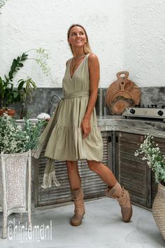 "⫸ We ship by EXPRESS EMS now for fast & safe delivery! Tiered Midi Dress is another playful addition to our Boho Alma Libra collection. Gorgeously feminine and so pleasant to wear, it will look amazing with heeled sandals or our ethnic canvas boots. Open back and midi length adds the charm and makes it even more suitable for hot and lazy summer days. It is very floaty by design. Light, soft and natural bamboo fabric brings this idea to life perfectly. It is available in classic black, dusty Cottagecore V-neck Dress With Ruffles, Flowy Cottagecore Dress For Vacation, Summer Cottagecore V-neck Dress, Cottagecore V-neck Ruffled Dresses, Cottagecore V-neck Dress For Garden Party, Cottagecore Sleeveless Vacation Dress, Sleeveless Cottagecore Dress For Brunch, Cotton V-neck Dress For Picnic, V-neck Sundress For Picnic