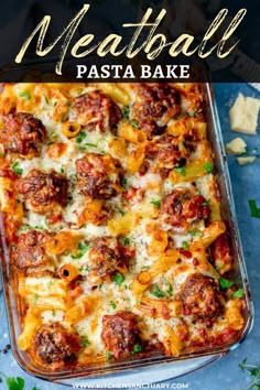 a casserole dish filled with meatballs and cheese