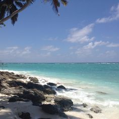 the beach is covered with rocks and water