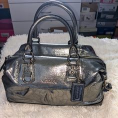 Metallic Pewter Handbag. Brand New Without Tags, Never Used. No Rips, Stains, Tears. Elegant Silver Bags, Silver Satchel With Double Handle And Top Carry Handle, Silver Satchel With Double Handle, Elegant Metallic Satchel Bag, Silver Travel Satchel With Handles, Travel Silver Satchel With Handles, Silver Travel Satchel, Chic Metallic Satchel Bag, Baggage Claim