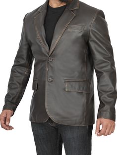 Our men's brown rub-off leather blazer is made with real lambskin leather and features a tailored fit, notch lapel, fully lined, and featuring three functional pockets. Wear it with jeans for a semi look or wear it with sleek trousers for a more formal ensemble. Specification: Material: Real Leather, soft polyester lining with quilted foam Front: Notch Lapel, Two Button Closure Pockets: One Chest Pocket, Two Flap Pockets, and Two Inner Pockets Color: Ruboff Brown Classic Leather Blazer For Semi-formal Occasions, Designer Leather Blazer For Fall, Leather Blazer With Leather Lining For Fall, Fall Leather Blazer With Leather Lining, Designer Brown Leather Blazer, Business Brown Leather Sport Coat, Designer Tailored Leather Jacket, Formal Brown Outerwear With Leather Lining, Fitted Leather Sport Coat For Semi-formal Occasions