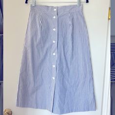 Adorable Frnch Blue And White Striped Midi Skirt With Button Detail Down The Front. Size Medium - Fits Similar To A Size 6/8. Brand New Condition. Classic Button-up Spring Skirt, Classic Summer Skirt With Buttons, Blue Button-up Summer Skirt, Blue Button-up Cotton Skirt, Blue Skirt With Button Closure For Day Out, Striped Midi Skirt, Skirt With Buttons, Mens Shirt, Women Skirts Midi