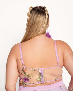 The Secret Pathways Floral Corset Top captures the essence of blooming summer days! It has a figure-flattering fit, a corset boning, and a sheer construction embroidered with wildflowers that'll have you feeling like strolling through a hidden paradise. Spring Coquette Underbust Corset, Spring Underbust Coquette Corset, Summer Corset With Bra Friendly Spaghetti Straps, Summer Corset With Spaghetti Straps And Bra-friendly Design, Spring Underbust Corset With Removable Bra Pads, Summer Bra With Delicate Straps And Fitted Stretch, Spring Fitted Bra Friendly Corset, Feminine Bra With Delicate Straps For Summer, Summer Sweetheart Neckline Corset