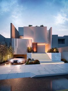 a car is parked in front of a modern house at dusk with steps leading up to it