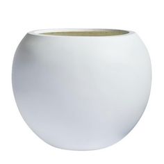 a large white vase sitting on top of a table