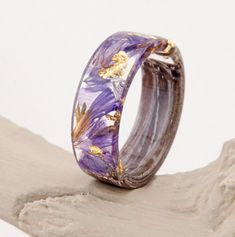 ❀Lavender Resin Ring with Pressed Flowers.  We present to you a truly unique and enchanting jewel with a touch of modern style. Plus, it is a perfectly fashionable minimalistic accessory to any outfit which will add special charm to your natural beauty. ❀ Nature Inspired Resin Ring With  Purple Lavender Flowers. Absolutely natural rings by VyTvir are made with great love towards nature and jewellery. The flowers are gathered by hand from fields and field, collected with the tender effort and aff Adjustable Lavender Amethyst Ring As A Gift, Adjustable Lavender Amethyst Ring Gift, Handmade Purple Rings For Wedding, Purple Jewelry With Natural Inclusions For A Gift, Handmade Lavender Jewelry For Weddings, Purple Flower Rings For Anniversary, Purple Flower Ring For Gift, Dried Lavender Wedding, Nature-inspired Pressed Flower Ring Jewelry