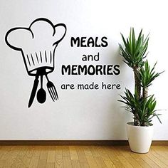 a kitchen wall decal with the words meals and memories are made here on it