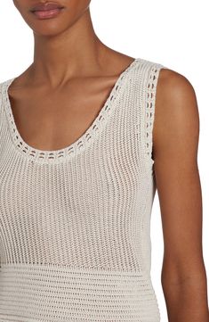 The Italian luxury fashion house continues to embody artisan craftsmanship with a masterfully knit sweater-tank trimmed with ornate openwork edges. Scoop neck Semisheer 75% cotton, 25% polyamide Hand wash, dry flat Made in Italy Designer Clothing Elegant Beige Textured Crochet Top, Elegant Cream Crochet Sleeveless Top, Elegant Open Knit Cotton Top, Elegant Cream Sleeveless Crochet Top, Openwork Sweater, Designer Clothing Brands, Italian Outfits, Golden Goose Deluxe Brand, Womens Cami