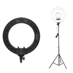 an image of a photography light and tripod set up for photo shoot on white background