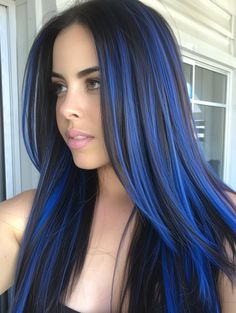 Last but not least, electric blue highlights are for the adventurous at heart. This vibrant color makes a powerful statement and can be applied as streaks or layered throughout for a more immersive effect. Best suited for dark hair, it’s a style that pairs well with bold fashion choices and creative personalities. Royal Blue And Black Hair, Black Hair With Royal Blue Highlights, Blue Hair Highlights For Brown Hair, Blue Highlights In Dark Hair, Navy Blue Hair Color Highlights, Blue Highlights In Dark Brown Hair, Blue Chunky Highlights In Brown Hair, Blue Hair Color Ideas For Short Hair, Blue And Brunette Hair