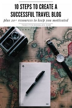 a notebook, camera and watch sitting on top of a map with the words 10 steps to create a successful travel blog