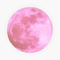 a pink full moon is shown in the sky