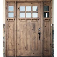 a wooden door with glass panels on the front and side doors are made of wood