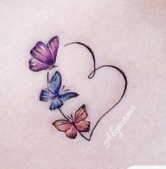 a heart with two butterflies on it