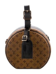 Louis Vuitton Top Handle BagBrown Coated CanvasLV MonogramGold-Tone HardwareLeather Lining & Single Interior PocketClasp Closure at TopIncludes Dust BagUnfortunately, due to restrictions, this item may not be eligible for shipping in all areas. Brown Round Case Bag For Formal Occasions, Brown Round Case Bag For Formal Events, Brown Round Case Bag With Detachable Strap, Brown Round Case Shoulder Bag For Travel, Louis Vuitton Top, Handbag Handles, Louis Vuitton Bag, Top Handle, Women Handbags