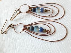 Handmade jewelry, copper wire wrapped earrings, bracelets, and necklaces, semi-precious gemstones and glass beads, unique design. ~Unique Design~ Each piece is designed and handcrafted by me. All of these unique styles are made to order especially for you. ~Who is this jewelry great for?~ An elegant, boho, classic style. You can wear it for a casual day or a dressed-up night on the town. This jewelry is a perfect gift for your mother, sister, girlfriend, wife, daughter or anyone who loves beautiful handmade jewelry. ~Materials~ Your handcrafted jewelry is made with various shades of copper or stainless steel wire. These wires are hypoallergenic for most people. They may tarnish over time if exposed to water. The beads used are semi-precious stones, glass, or ceramic.  ~Gifts~ Each order co Bohemian Copper Wire Jewelry With Round Beads, Beaded Copper Wire Dangle Jewelry, Teardrop Copper Wire Wrapped Jewelry, Bohemian Teardrop Copper Wire Jewelry, Copper Wire Dangle Jewelry For Jewelry Making, Bijoux Fil Aluminium, Wire Wrapped Earrings, Wedding Jewelry Earrings, Wedding Earrings