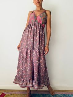 Effortless wear loose and comfortable high waist sundress  Lined loose fitting free flowing dress for everyday wear  Made in light, soft and silky material with floral prints  perfect vacation dress, beach outfit for the summer time MEASURE bust 39" stretchy waist 37" loose flared around hips length 55"( but can be adjusted with straps ) More boho style ideas at  https://www.etsy.com/shop/AltheaStores Thank You for looking Beach Sundress In Rayon With Maxi Length, Beach Rayon Maxi Sundress, Summer Rayon Maxi Dress With Halter Neck, Beach Season Sundress Halter Maxi Dress, Summer Flowy Maxi Dress With Spaghetti Straps, Summer Halter Neck Maxi Dress In Rayon, Pink Boho Print Dress For Summer, Bohemian Flowy Halter Neck Beach Dress, Bohemian Halter Neck Flowy Beach Dress