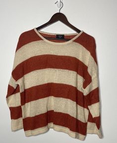 Vici burnt orange and cream striped sweater. Size Small. Oversized and slouchy. Wool blend. Soft and cozy knit. Smoke free home. Approximate Measurements: (laying flat and unstretched) Pit to pit: 29in Sleeve: 26in (top of shoulder to cuff) Length: 26in (Inventory NNN024) Oversized Striped Sweater For Fall, Oversized Striped Cozy Sweater, Cozy Oversized Striped Sweater, Fall Striped Soft Knit Sweater, Striped Soft Knit Sweater For Fall, Cozy Striped Sweater For Fall, Soft Knit Striped Sweater For Fall, Striped Sweater For Layering In Fall, Orange Cream