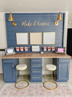 a desk with two stools in front of it