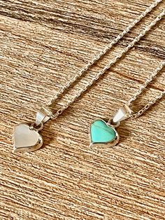 "Beautiful tiny sterling silver heart pendant necklace with turquoise or mother of pearl. All handcrafted. Stamped 925 * Pendant measurements: 10 x 17mm * Made in Italy chain is optional Two lengths (adjustable) available: 1) 16 - 18\" - 40 - 45 cm 2) 18 - 20\" - 45 - 50 cm 925N-007" Dainty Sterling Silver Heart Gemstone Necklace, Dainty Silver Turquoise Necklace For Gift, Dainty Sterling Silver Turquoise Necklace Gift, Adjustable Sterling Silver Turquoise Necklace Gift, Gift-ready Adjustable Turquoise Sterling Silver Necklace, Dainty Handmade Sterling Silver Heart Necklace, Sterling Silver Turquoise Necklace Gift, Tiny Sterling Silver Heart Pendant, Sterling Silver Turquoise Necklace With Heart Charm