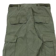 Description:Vintage Unbranded green cargo trousers, fit a UK size 8 - high waisted with a 26" waist. Size conversion: US Size: 4EU Size: 36IT Size: 40 RISE TYPE: High WaistedWAIST: 26 inches / 66cmsINSEAM: 32 inches / 81cmsRISE: 12 inches / 30cmsGENDER: womens CONDITION: very good.STYLE: cargo trousersERA: 1990sCOLOUR: greenFABRIC: cotton High-waisted Green Cotton Cargo Pants, Military Cotton Cargo Bottoms, Green Military Cargo Jeans With Pockets, Green Cargo Pocket Ankle-length Bottoms, Military Nylon Cargo Pants With Cargo Pockets, Cargo Trousers, Green Cotton, Trousers, High Waisted