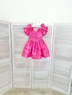 Pink girl pageant cocktail dress with ruffled sleeves/ Pageant outfit/ Teens cocktail dress/ Custom pageant dresses This beautiful dress is made out of taffeta. The dress has viscose lining and zipper back. It is easy to care and comfortable to wear. The dress comes in upper knee length. The dress is perfect all pageant events as cocktail dress. It is absolutely stunning on!  Materials Taffeta, viscose  Colors and sizes The dress can be made in any color and size.  Message me and I'll happily send you a color chart.  All dresses are made to order.  Dress is tailored to order in any standard size.  The size chart is the picture of the listing. If you want it to fit perfectly send me please the measurements of your girl. I would need chest, waist and total height. From shoulder to waist, fro Elegant Fitted Ruffle Dress For Dress-up Occasions, Elegant Pink Ruffle Dress For Dress-up Occasions, Fitted Pink Ruffle Dress For Dress-up, Fitted Flutter Sleeve Dress For Dress-up, Pink Ruffled Dress For Prom Season, Princess Dresses With Ruffles For Costume Party, Fitted Short Sleeve Princess Dress For Party, Fitted Princess Dress With Short Sleeves For Party, Fitted Princess Dress With Ruffles And Short Sleeves