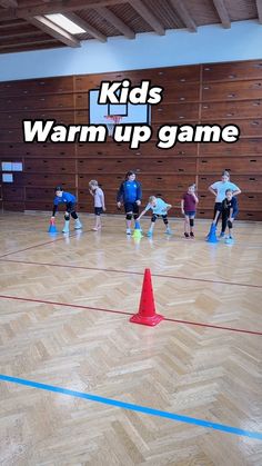 kids warm up game with cones on the floor