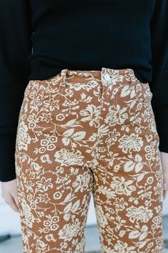 ALL SALES FINAL NOT ELIGIBLE FOR RETURN Step into style with the Keely Pant! These brown, floral-printed beauties are made from lightweight denim for all-day comfort. Featuring functioning buttons, pockets, and a zipper, plus sizes also have an elastic waistline. With a chic straight leg, these pants are a must-have for any wardrobe. The brand of these jeans are Polagram. Model is wearing a small and is 5'5". Shown wearing the Seely Sweater. Plus model is wearing a 1X and is 5'2". Shown wearing Relaxed Fit Floral Print Cotton Jeans, Cotton Bottoms With Floral Print, Relaxed Fit Wide Leg Jeans With Floral Print, Relaxed Fit Wide Leg Floral Print Jeans, Casual Straight Leg Bottoms With Floral Print, Floral Print Wide Leg Relaxed Fit Jeans, Floral Print Wide Leg Jeans With Relaxed Fit, Casual Straight Leg Floral Print Jeans, Casual Floral Print Straight Leg Jeans