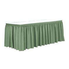 a green bed skirt with pleated edges